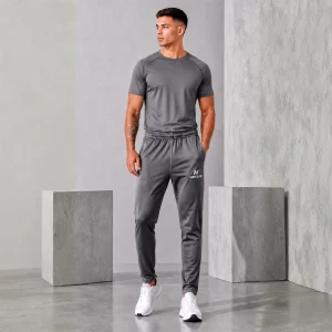 NEKLIX men’s grey 4-way stretch slim fit track pant front view with elastic waistband, side pockets